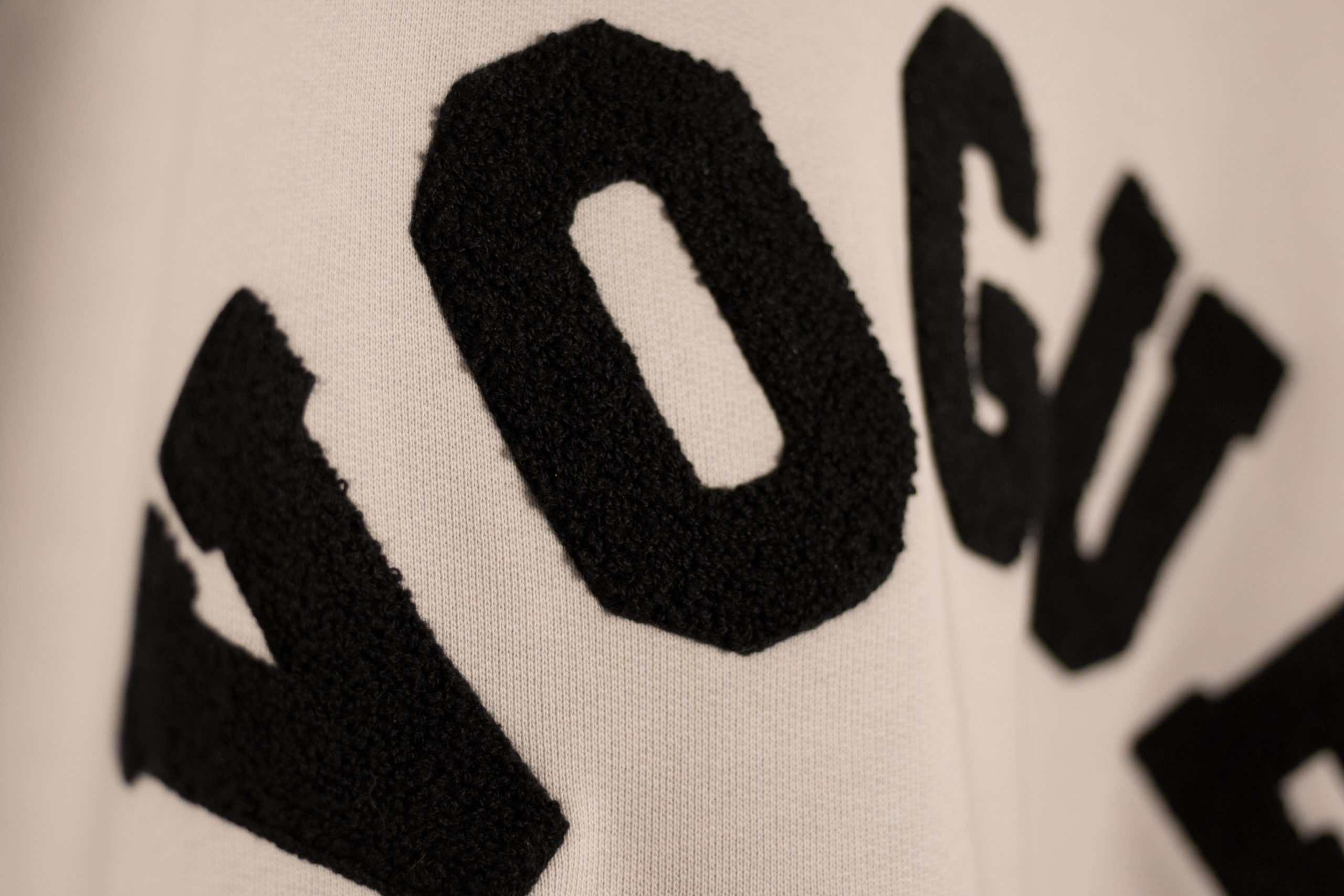 colorful standard sweater only close up-123203